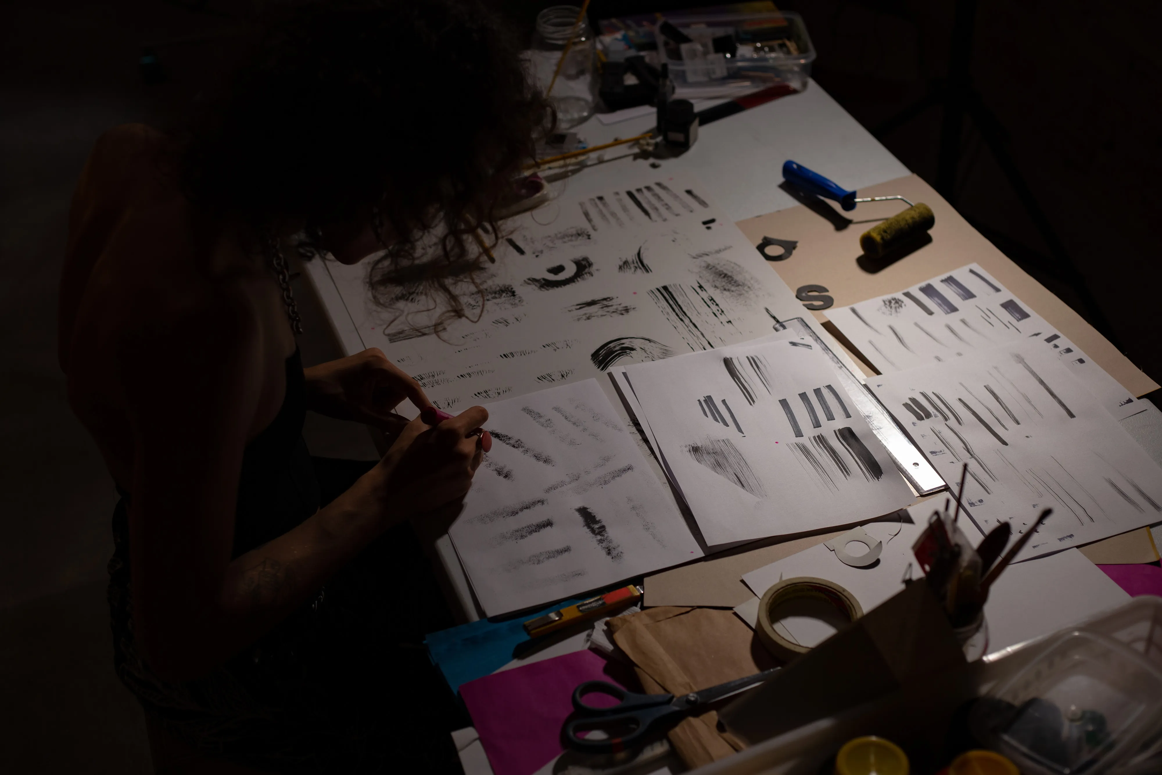 some sheets of paper on top of a table that show the textures that were created by joanna